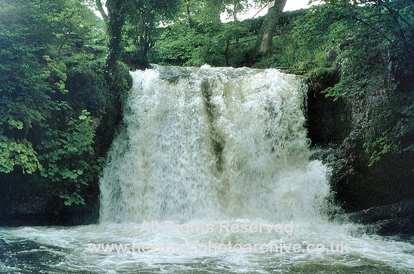 Malham, Janets Foss waterfall in flood 1974