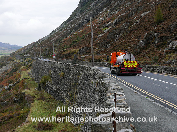 HRS 11402  Nant Ffrancon pass, old road, vehicle on new road by Telford L7770304