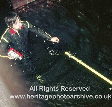 HRS 3850 Diver wades in canal water Granada end of tunnel