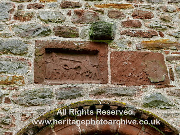HRS 10466 Bolton village, Church of All Saints, medieval carving of josting L7750027