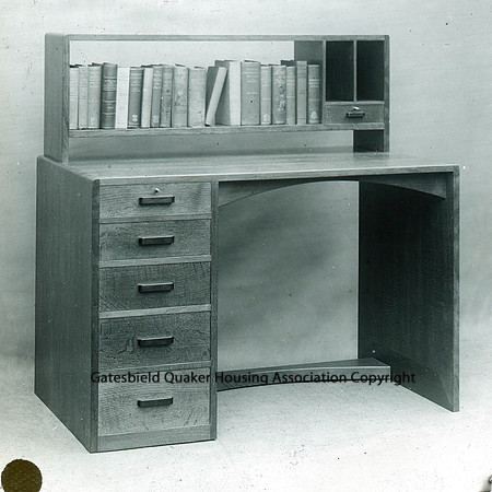 Five drawer desk with book rack