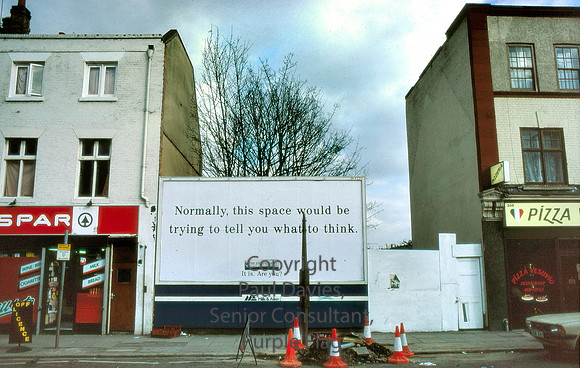 London, Deptford shops and advertising hoarding