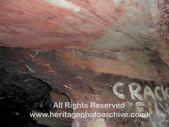 HRS 1162 Frodsham Caves, Close up of 19th C carved graffiti 2005
