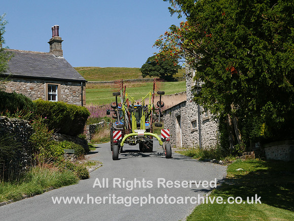 HRS 11290 Stainforth, tractor in village 2022