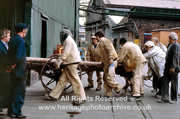 HRS 10006 St Helens, Pilkington Glass, 22.0 Men moving roller into building 1980