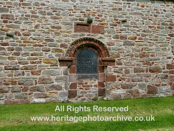 HRS 10464 Bolton village, Church of All Saints, doorway and carving qv L7750028