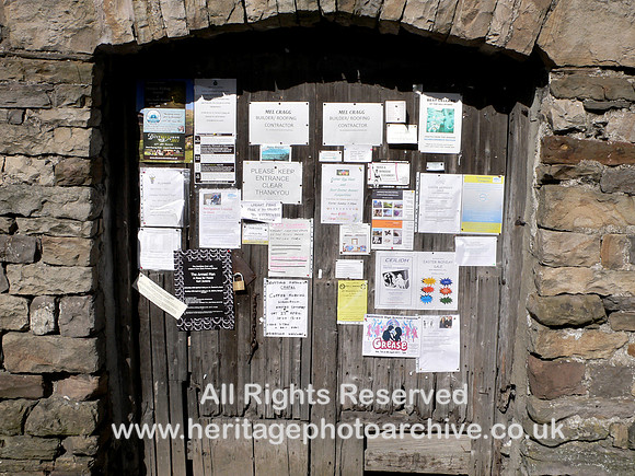 HRS 10524 Sedbergh, Farfield Mill, notice board on warehouse door 2011 L1120925