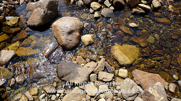 Stream bed erratics