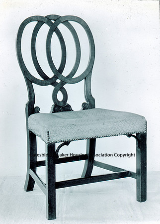 Chair with hooped wooden back