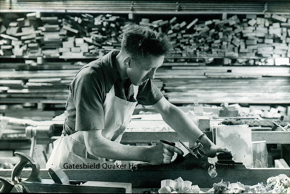 Man Planing timber
