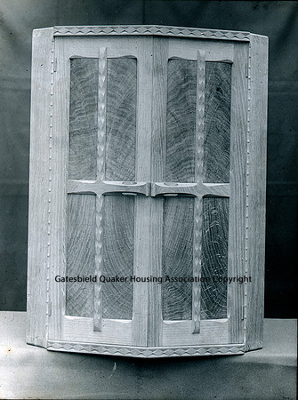 Wooden cupboard cruciform motifs on doors